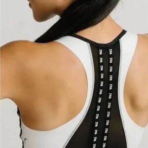 ZYIA Black on White Game Day Light n Tight Bra Small